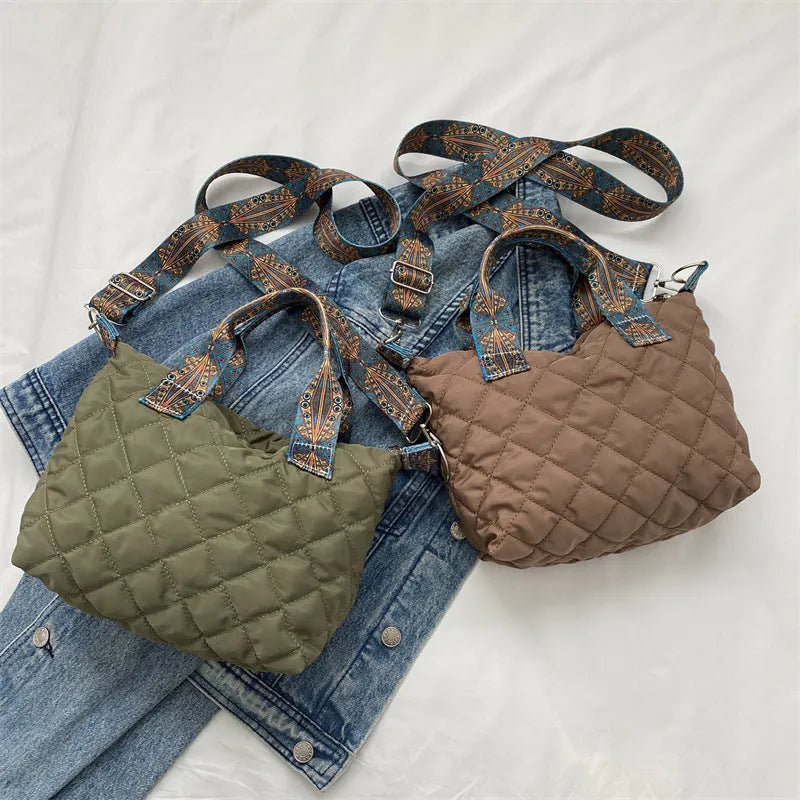 Oxford cloth messenger bag in horizontal square shape with single shoulder strap and sandwich pocket