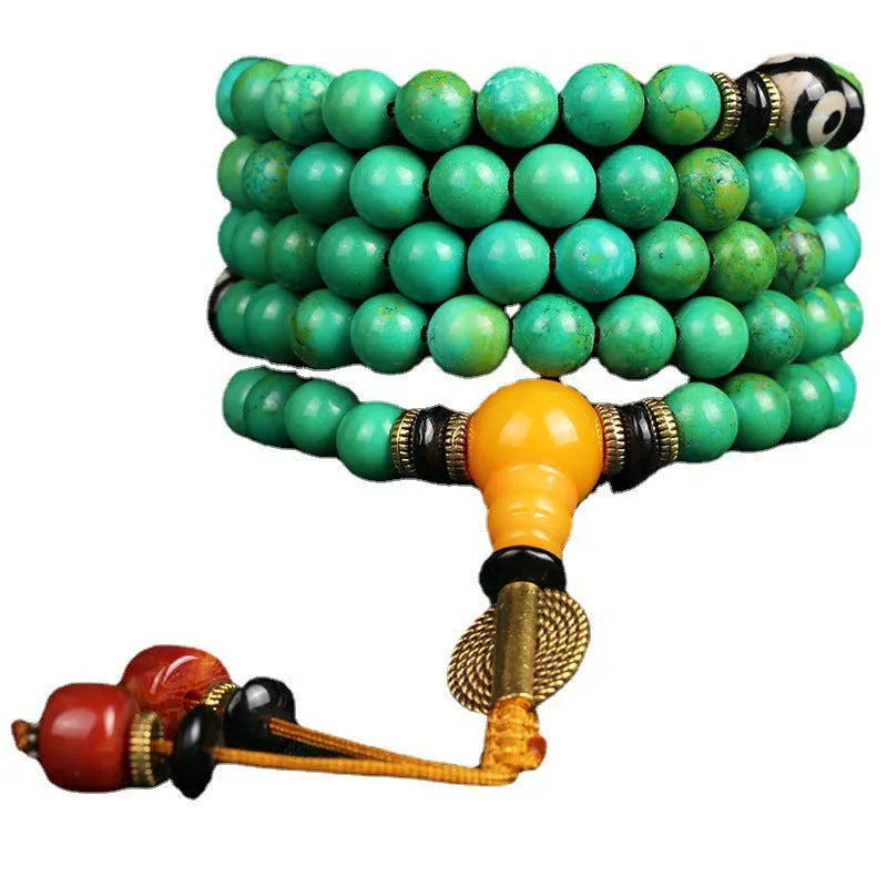 Natural turquoise gemstone bracelet with 108 round 8mm polished beads.