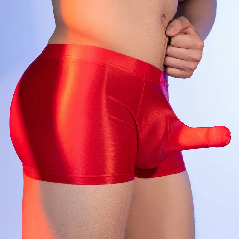 Men's red boxer shorts with a large white elephant nose graphic on the front.