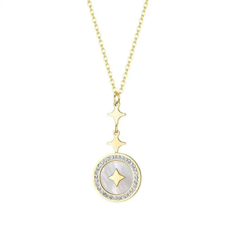 Close-up of a hexagonal six-pointed star titanium steel pendant necklace on a gold O-ring chain.