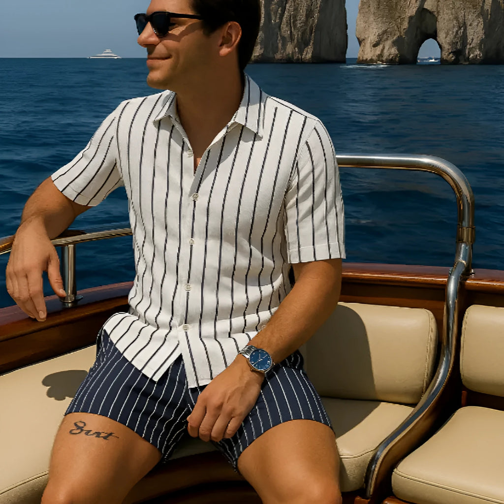Men's beach shirt and shorts set in four-sided elastic fabric showing light mature casual style
