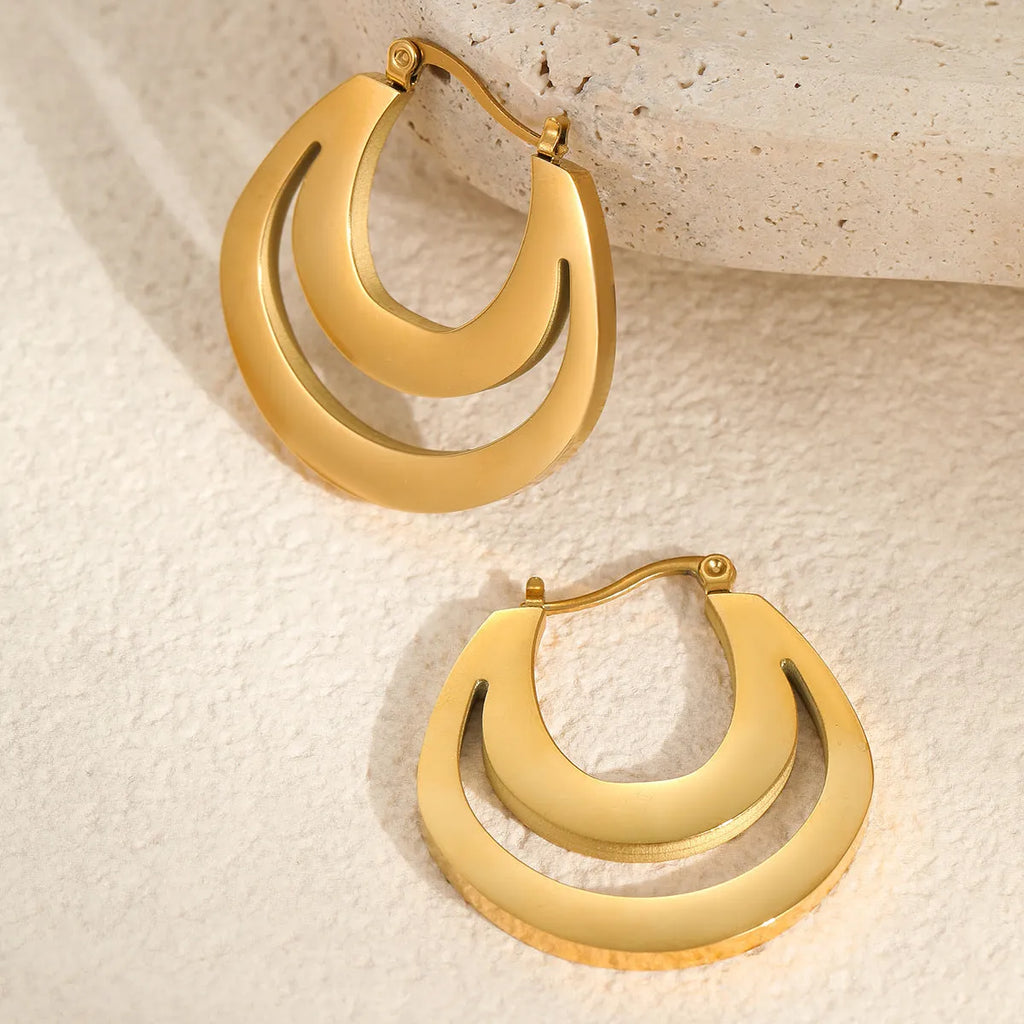 Geometric gold-plated French earrings with stainless steel construction and round ring design elements