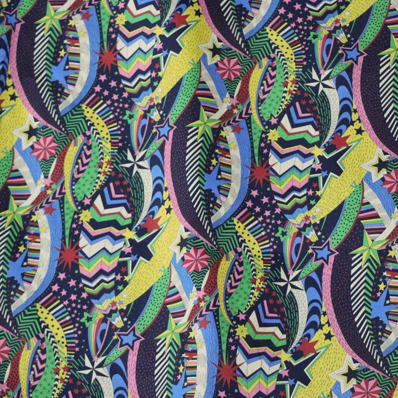 Blue cotton fabric with digital print of plants and flowers, showing 145cm width.