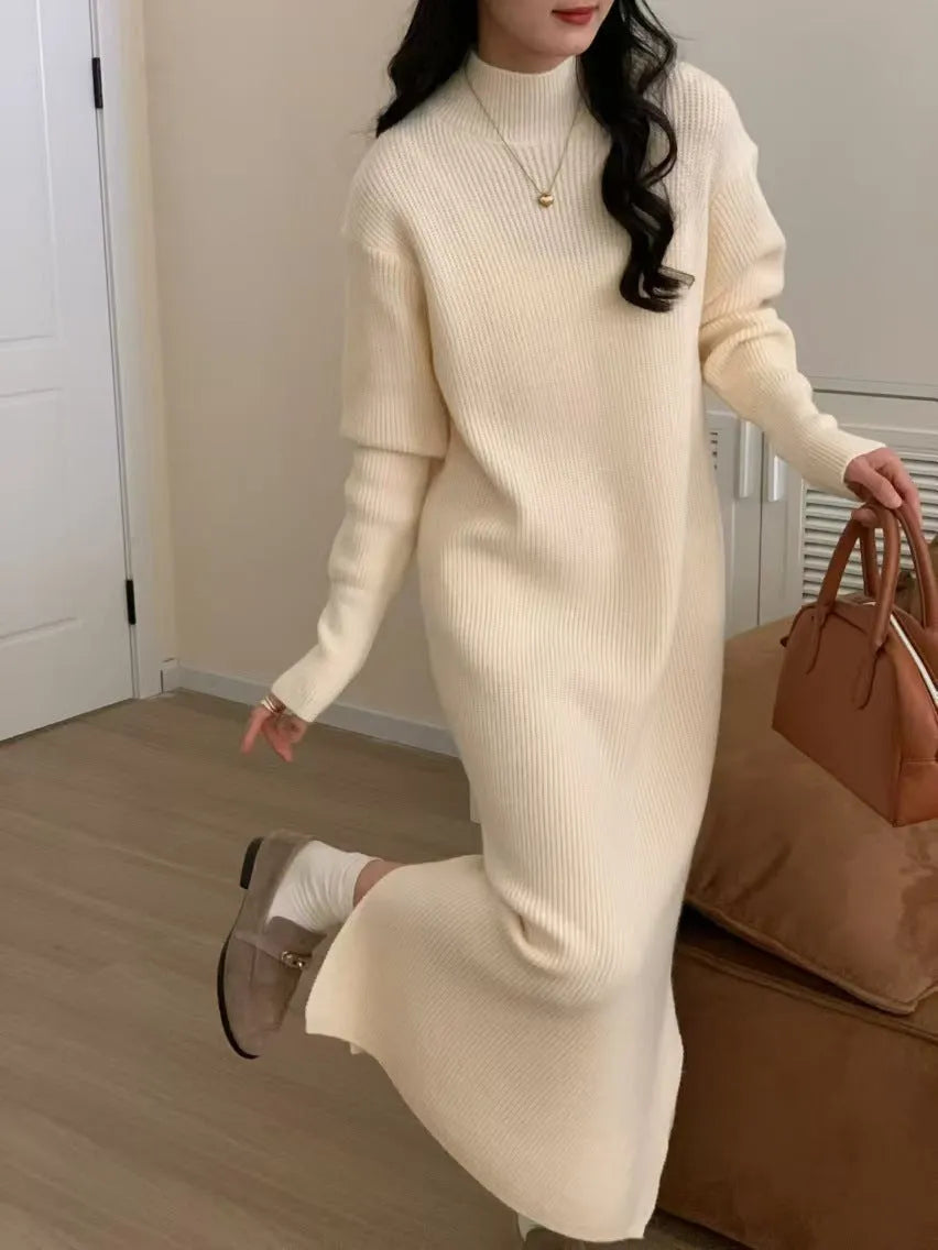 Acrylic half turtleneck knitted dress in graphite colour with high waist and overknee long length