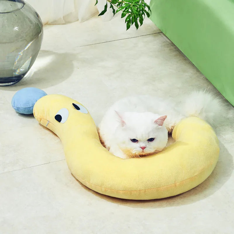 Blue and yellow rectangular pet cushion measuring 62 by 39 centimetres for dogs and cats