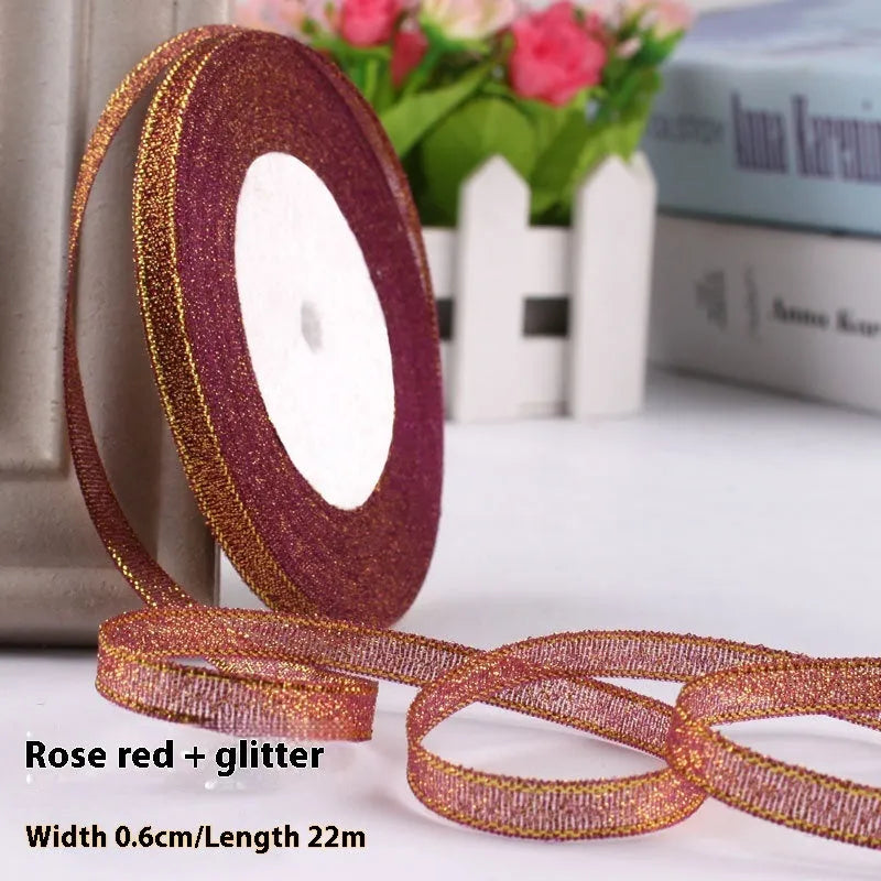 Roll of polyester gift packaging ribbon with 0.6cm width and 22 metre length in various colour options