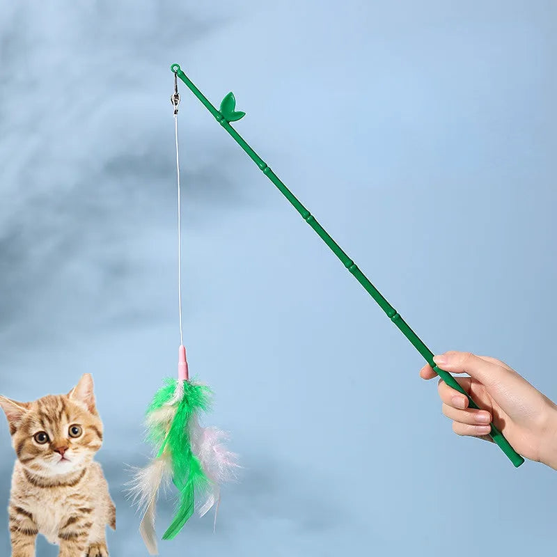 Green cat feather wand toy with bells and feather attachments for interactive feline play