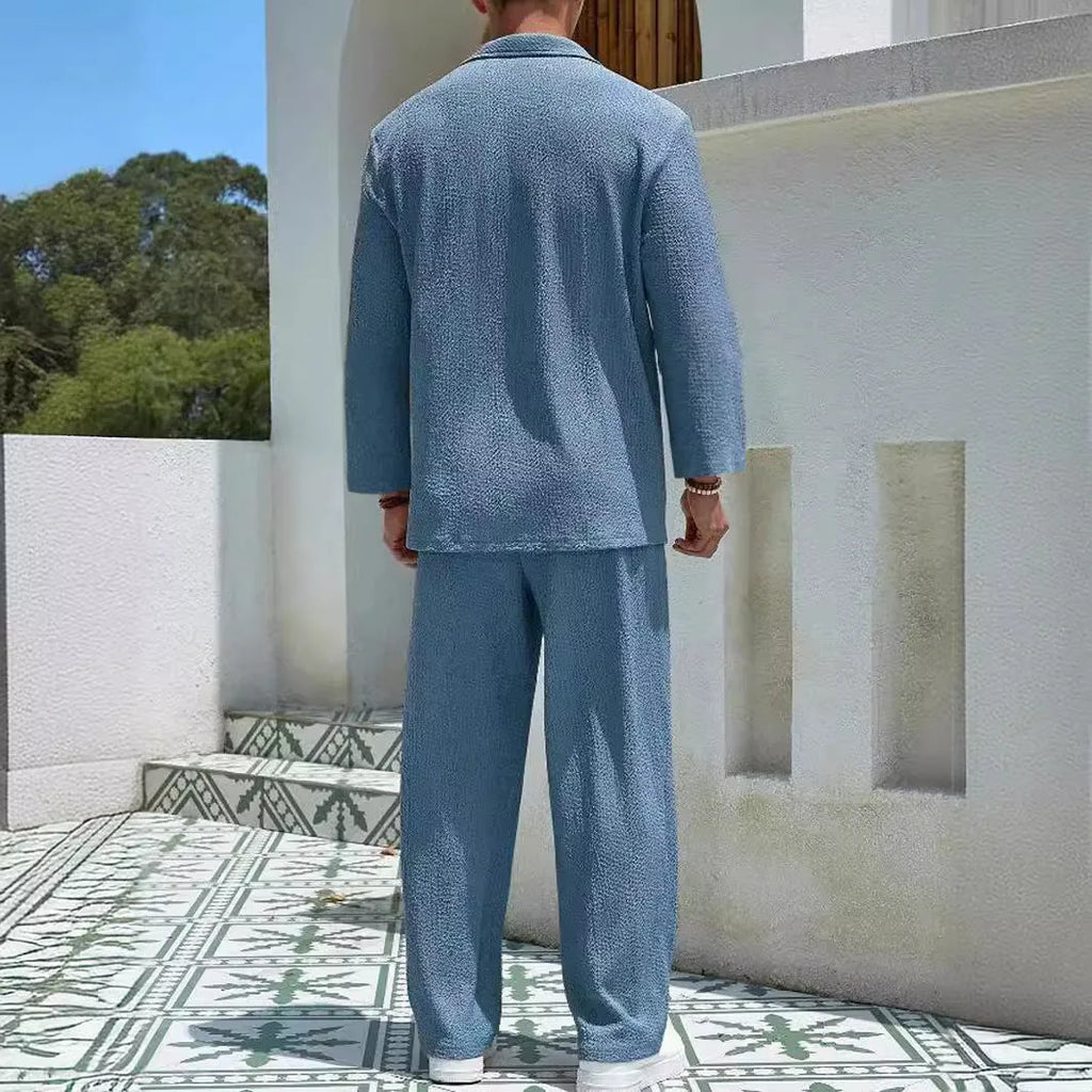 Men's casual polyester shirt trousers set in four colour options with young casual styling