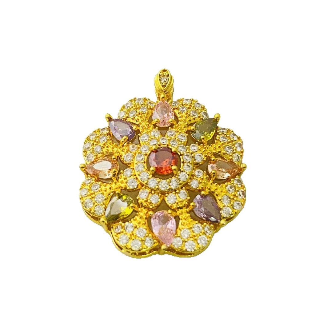 Close-up of a women's flower-shaped zircon pendant necklace in a gold colour finish on a chain.