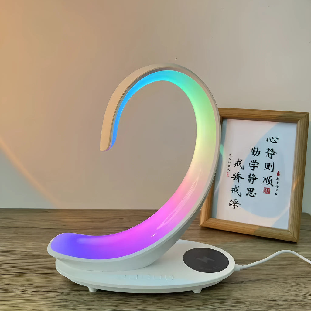 White swan desktop wireless charger with Bluetooth speaker and colourful atmospheric lighting