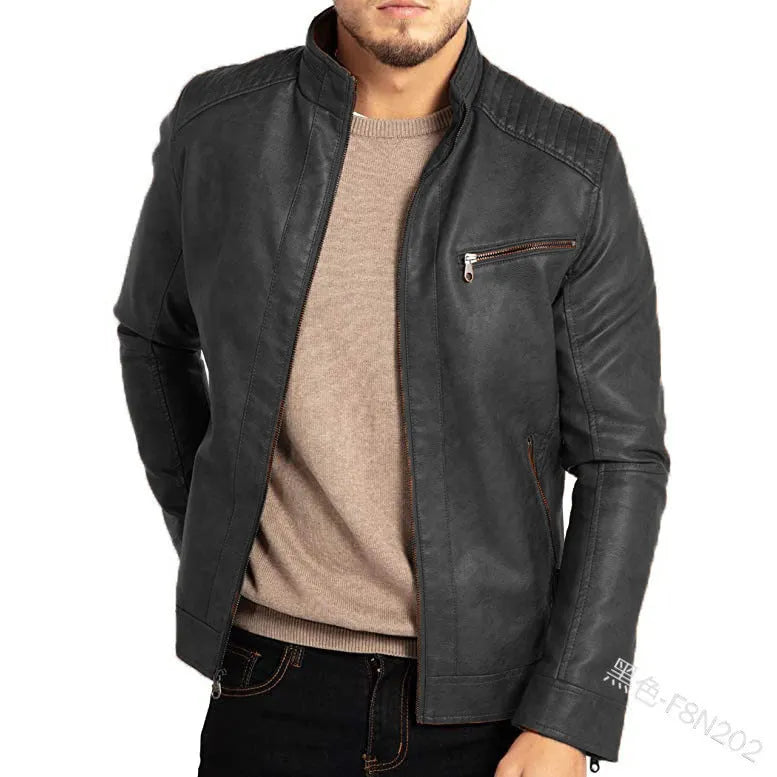 Man wearing a brown punk-style stand collar artificial leather motorcycle jacket with patch pockets.