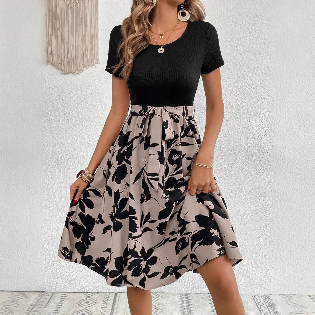 Women's khaki dress with plant pattern, A-line skirt, and shoulder strap detailing