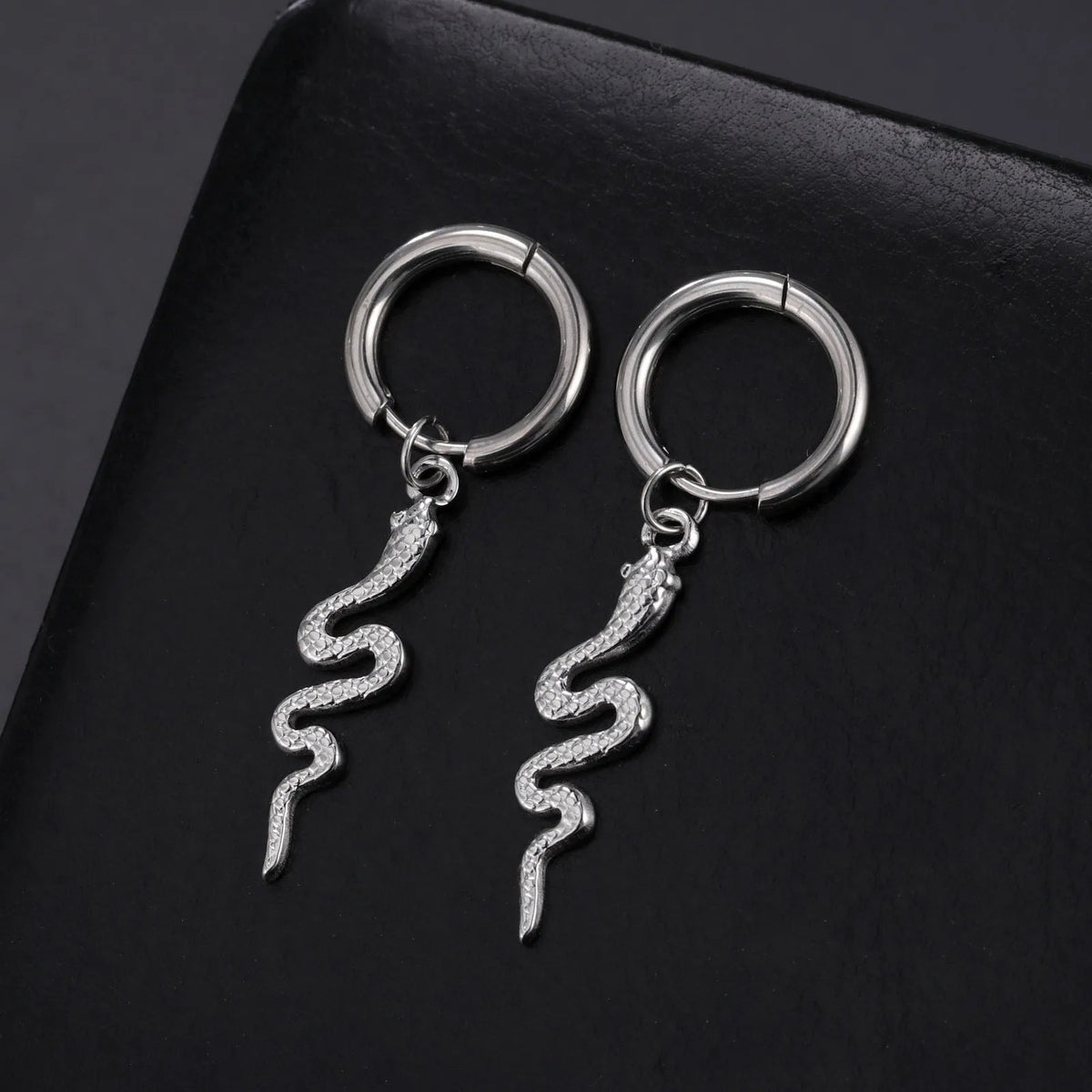 Gold plated snake-shaped stainless steel clip earrings with vintage animal design