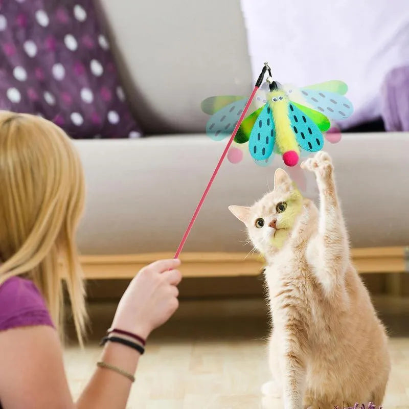 Blue yellow and pink cat teaser wand with dragonfly attachment and bell on a 49cm stick.