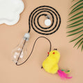 Interactive cat toy hanging on door frame with elastic rope, dangling mouse toy, and treat reward bulb