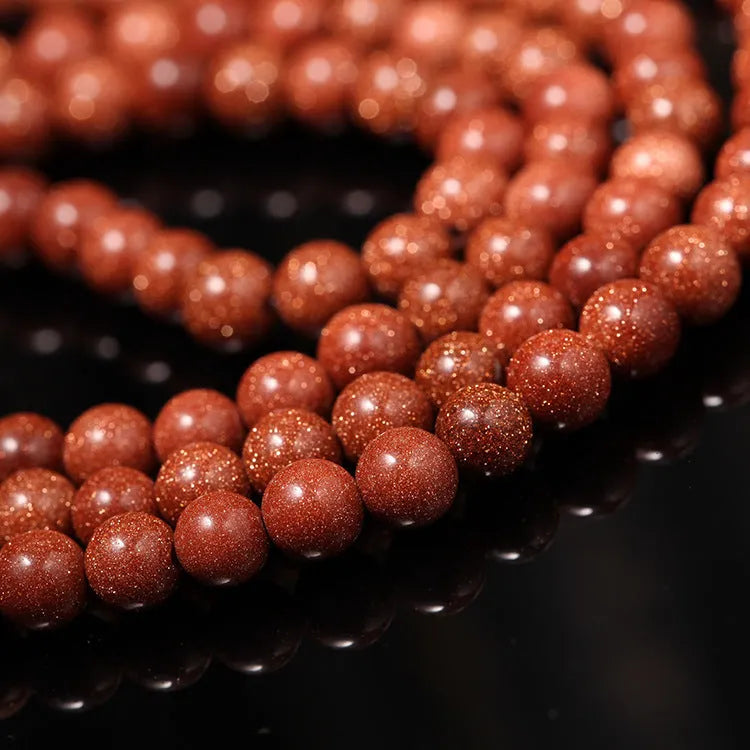 Women's multi-circle bracelet with 108 nugget sand beads, golden star stone accents, and retro fu character charms
