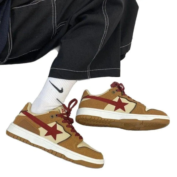 Brown women's low-top sneakers with sequin trim and platform heel on rubber sole.