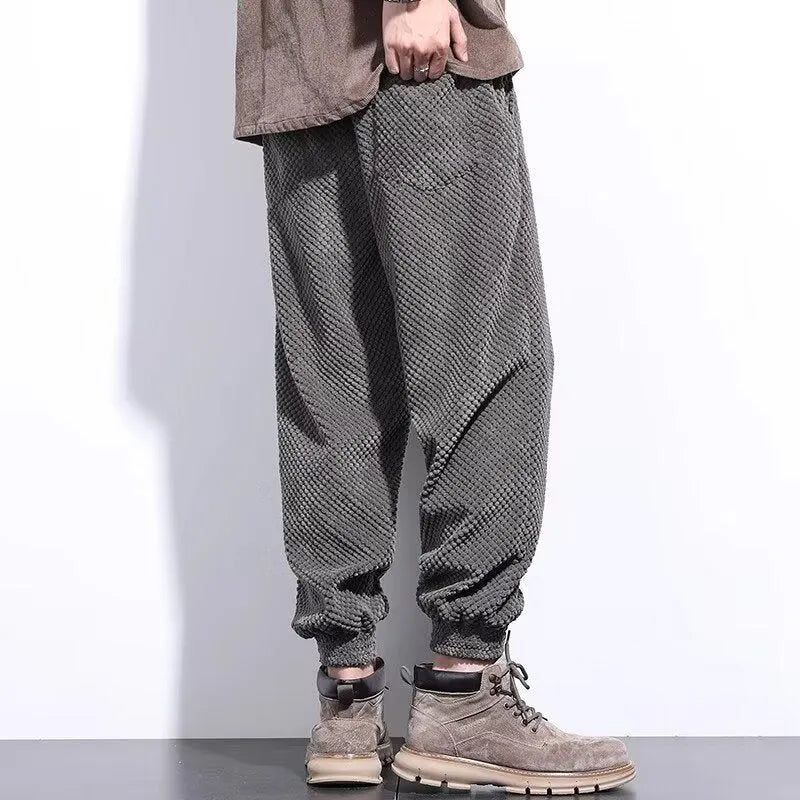 Men's grey straight leg sweatpants with ankle tie fastening on waistband