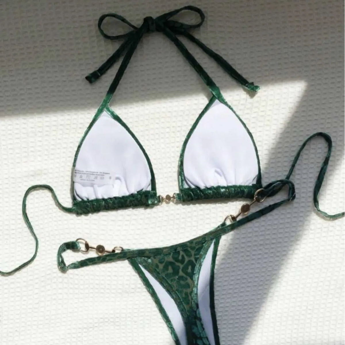 Women's leopard print bikini set in blue, green, and multicolour patterns with T-shaped design