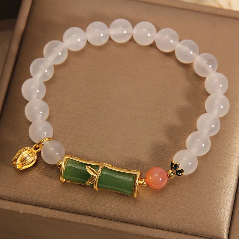 White agate and jade Chinese style bamboo beaded bracelet for women with retro luxury design