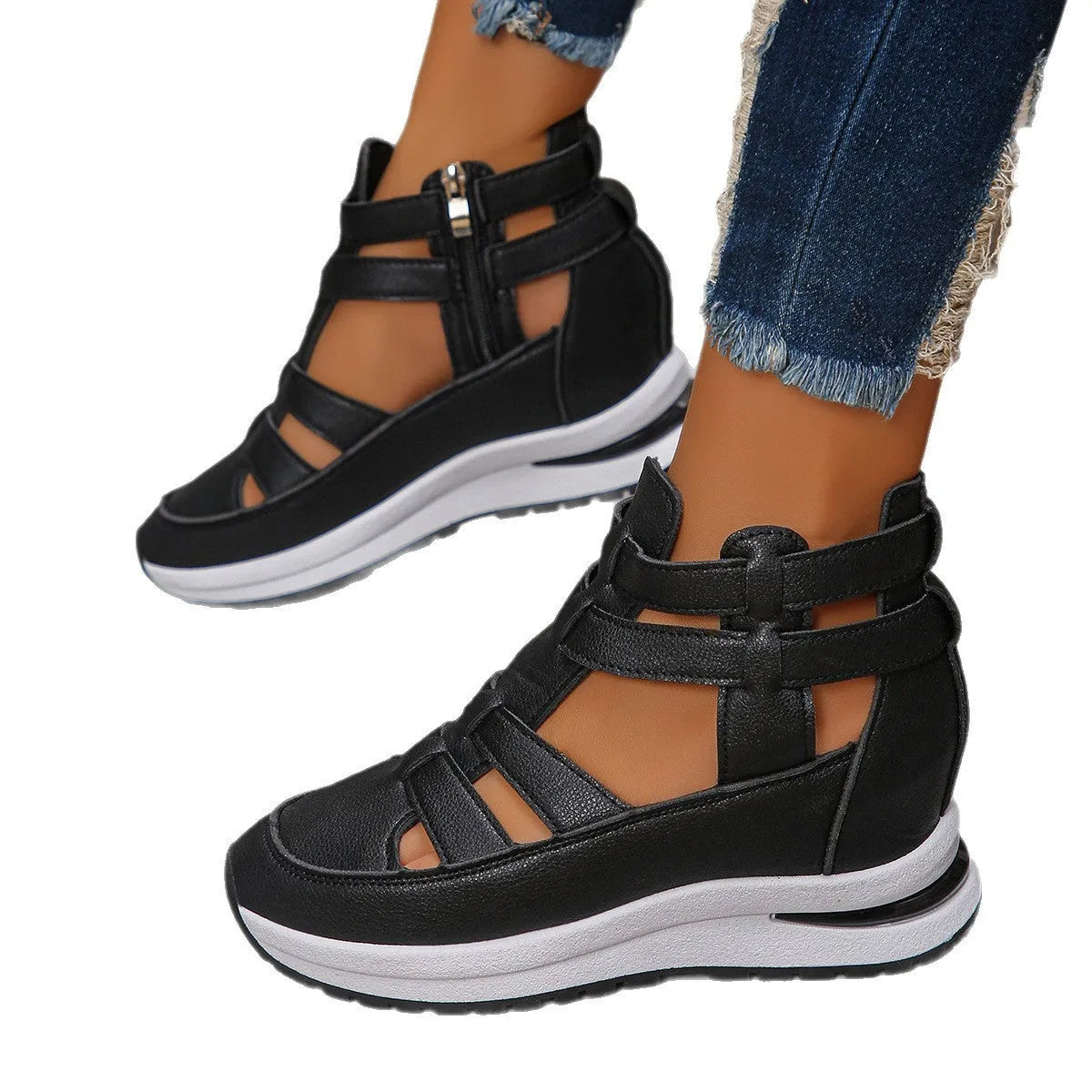 Women's black close-toed hollow-out platform sandals with Velcro strap on a white background.