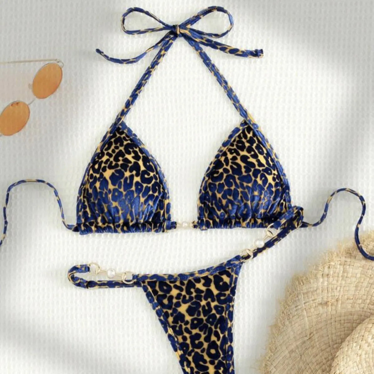 Women's leopard print bikini set in blue, green, and multicolour patterns with T-shaped design