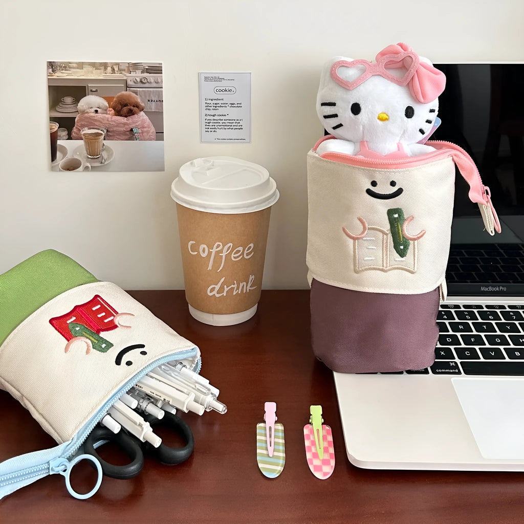 Korean-style Oxford fabric pencil case measuring 17cm by 14cm in brown or green colours