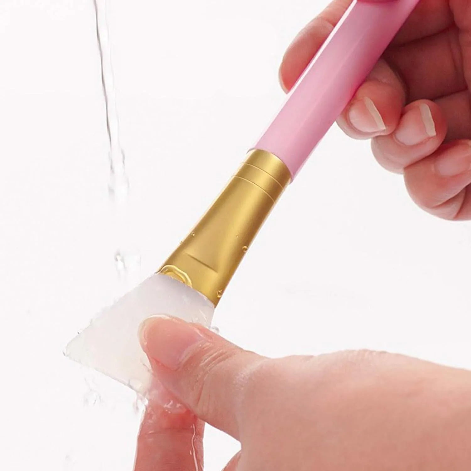 Reusable silicone face and body mask applicator spatula tool in choice of six colours.
