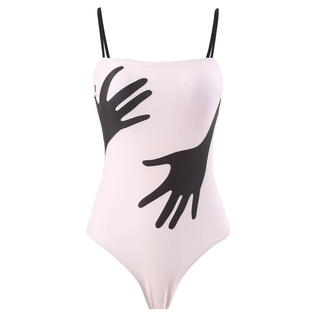 Women's patterned polyester bikini swimsuit with a long attached tulle skirt overlay.