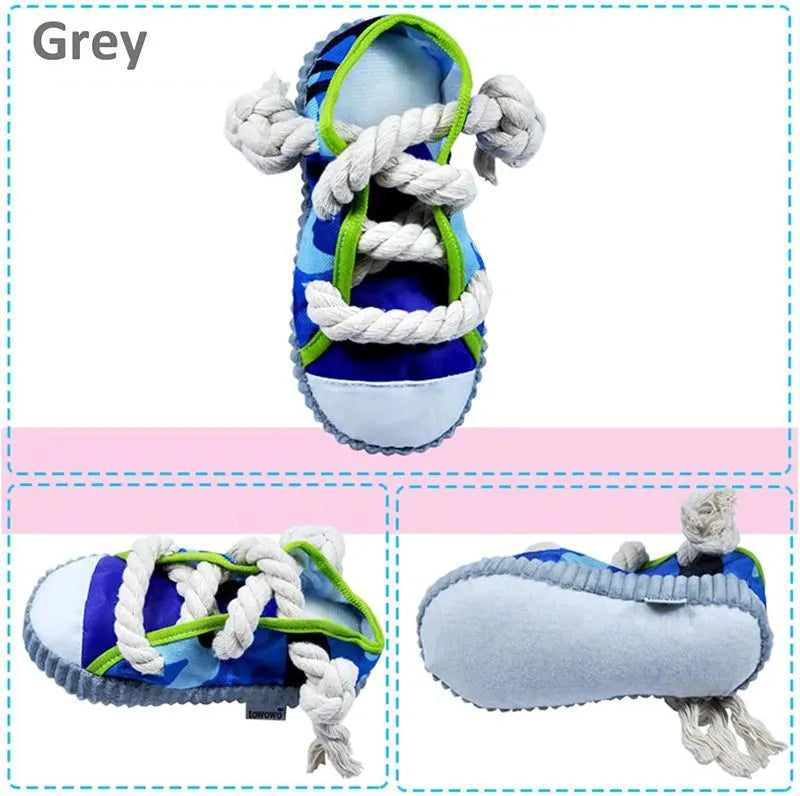 Realistic shoe-shaped dog toy in grey, purple, or yellow with laces, sole patterns, built-in squeaker and bell.