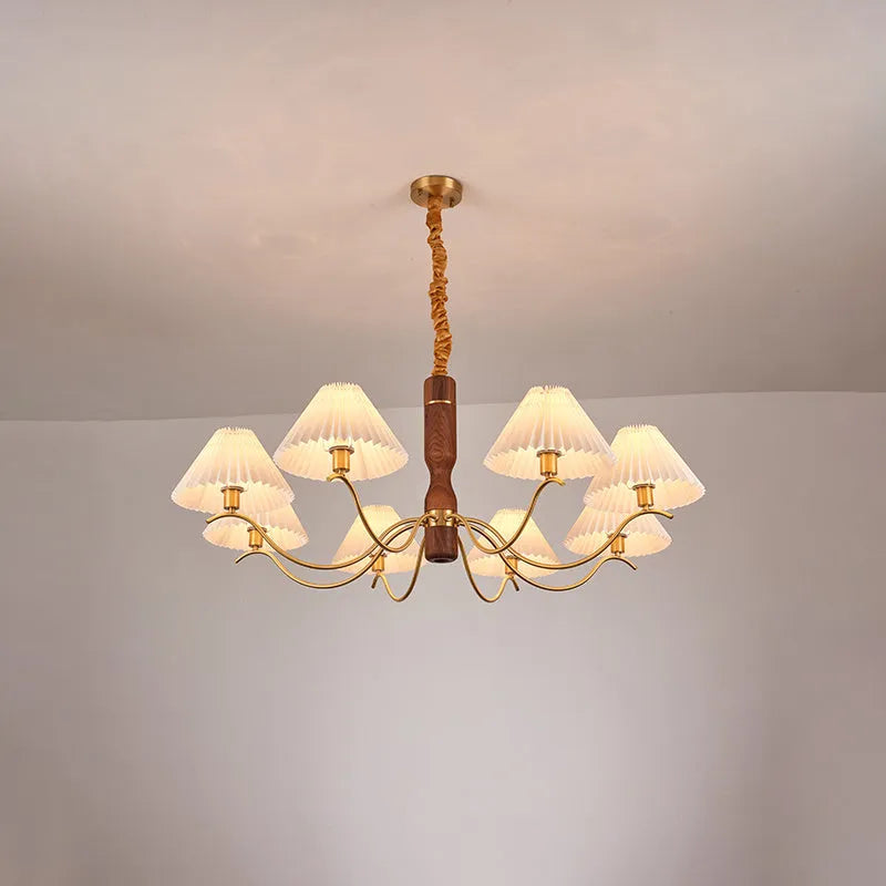American Retro style wooden wall lamp with copper accents and a white fabric shade mounted above a bedside table.