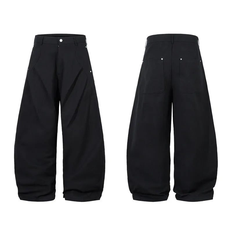 Men's black pleated machete casual trousers with loose-fitting wide-leg design and cotton construction
