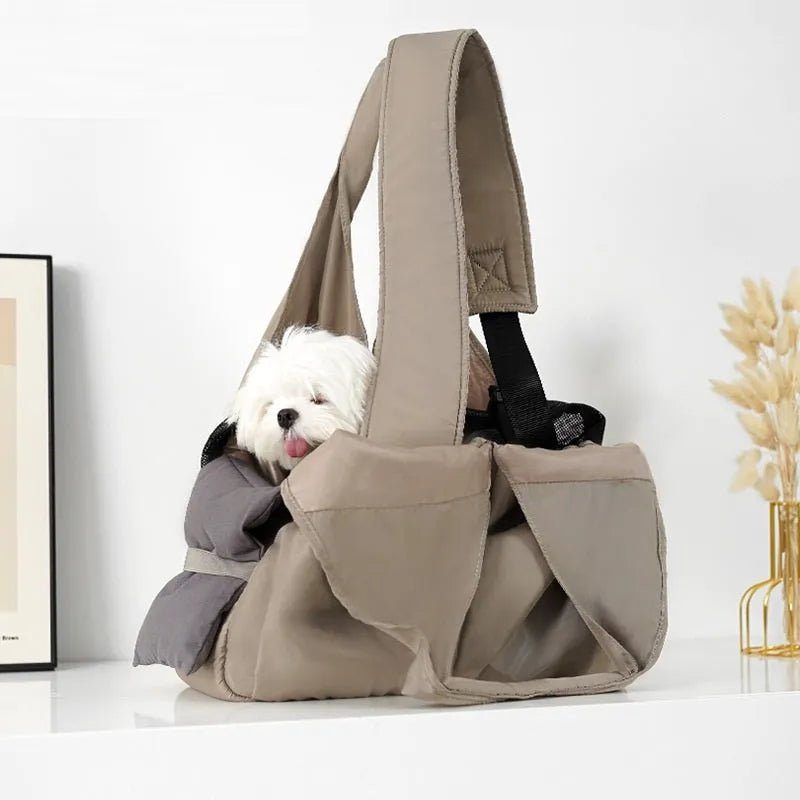 Apricot coloured cloth pet carrier handbag for small dogs and cats, shown with dimensions 41cm by 16cm by 28cm.