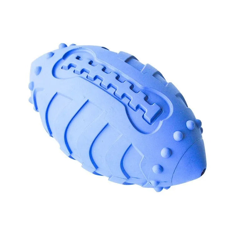 Light green thickened rubber rugby ball dog toy with squeaker for bite-resistant interactive training and teeth cleaning.