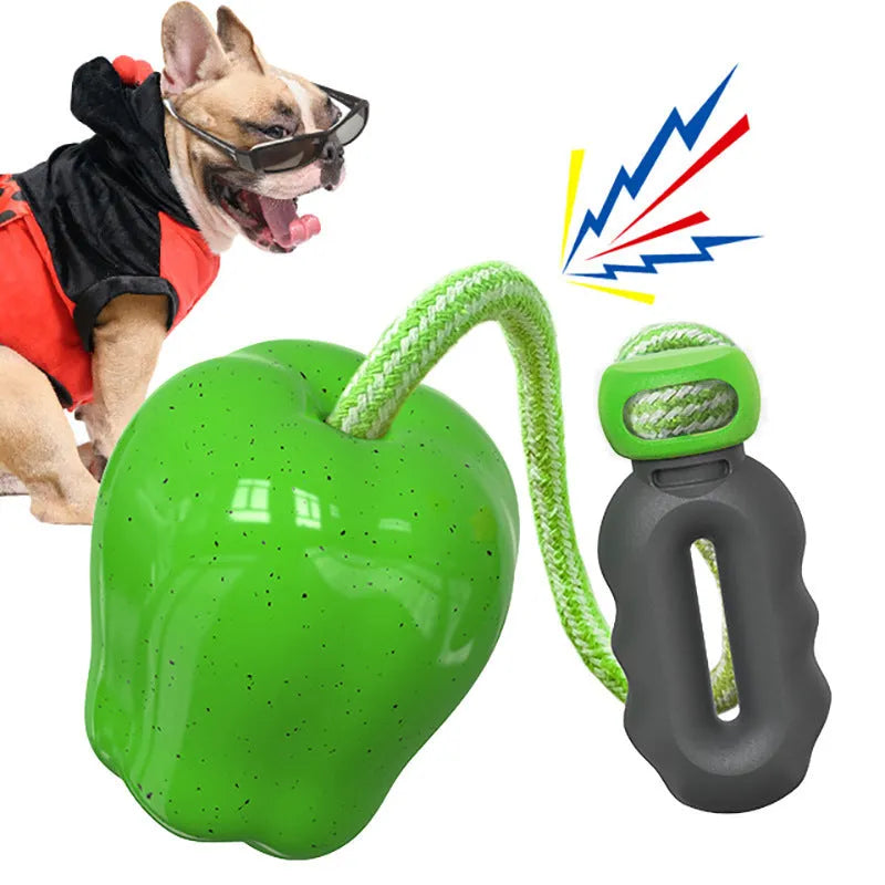 Green plastic apple-shaped dog toy with food dropping ball function and squeaker