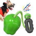 Green plastic apple-shaped dog toy with food dropping ball function and squeaker