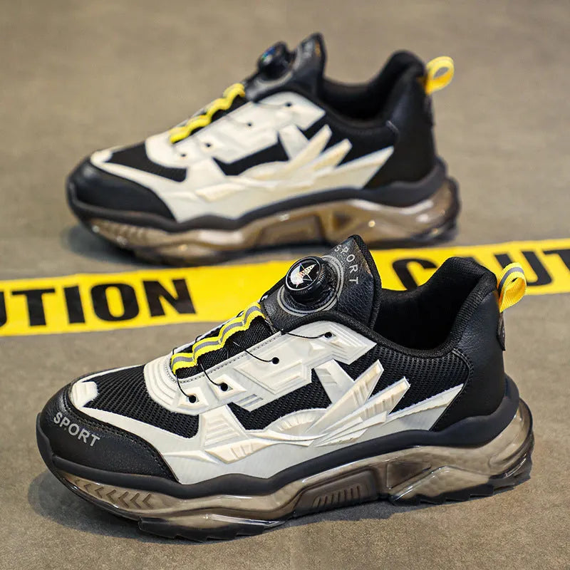 Men's black rotating button casual sneakers with mesh upper and low platform sole.