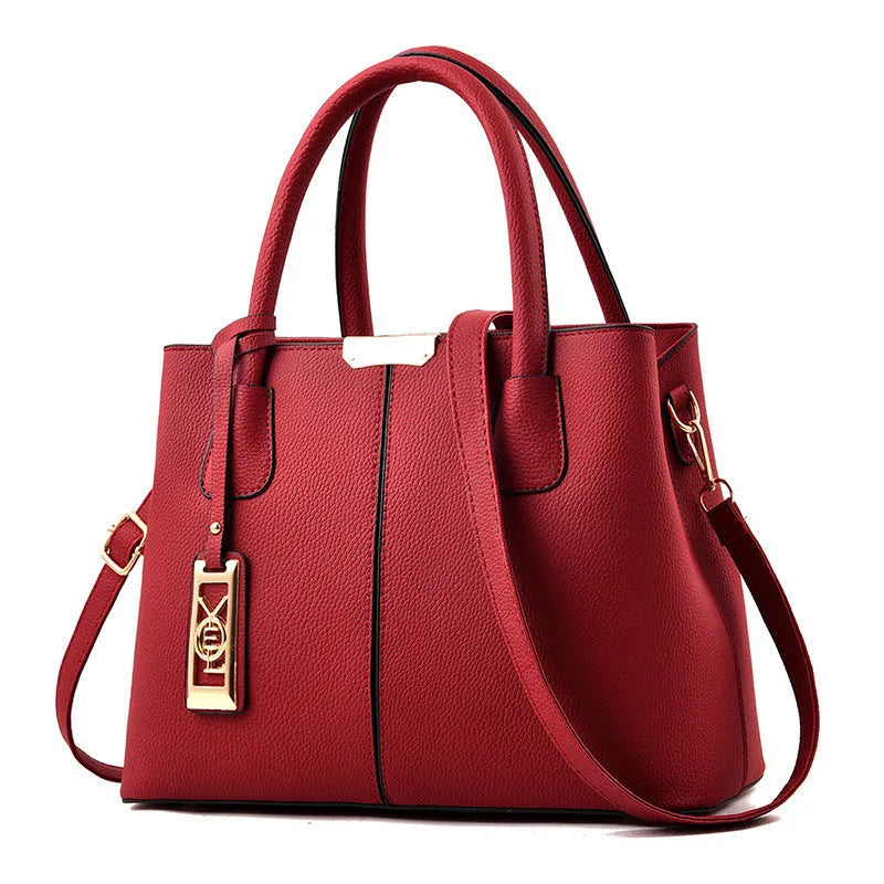 Soft PU women's tote bag in a horizontal square shape with a single leather shoulder strap, shown in a plaid pattern.