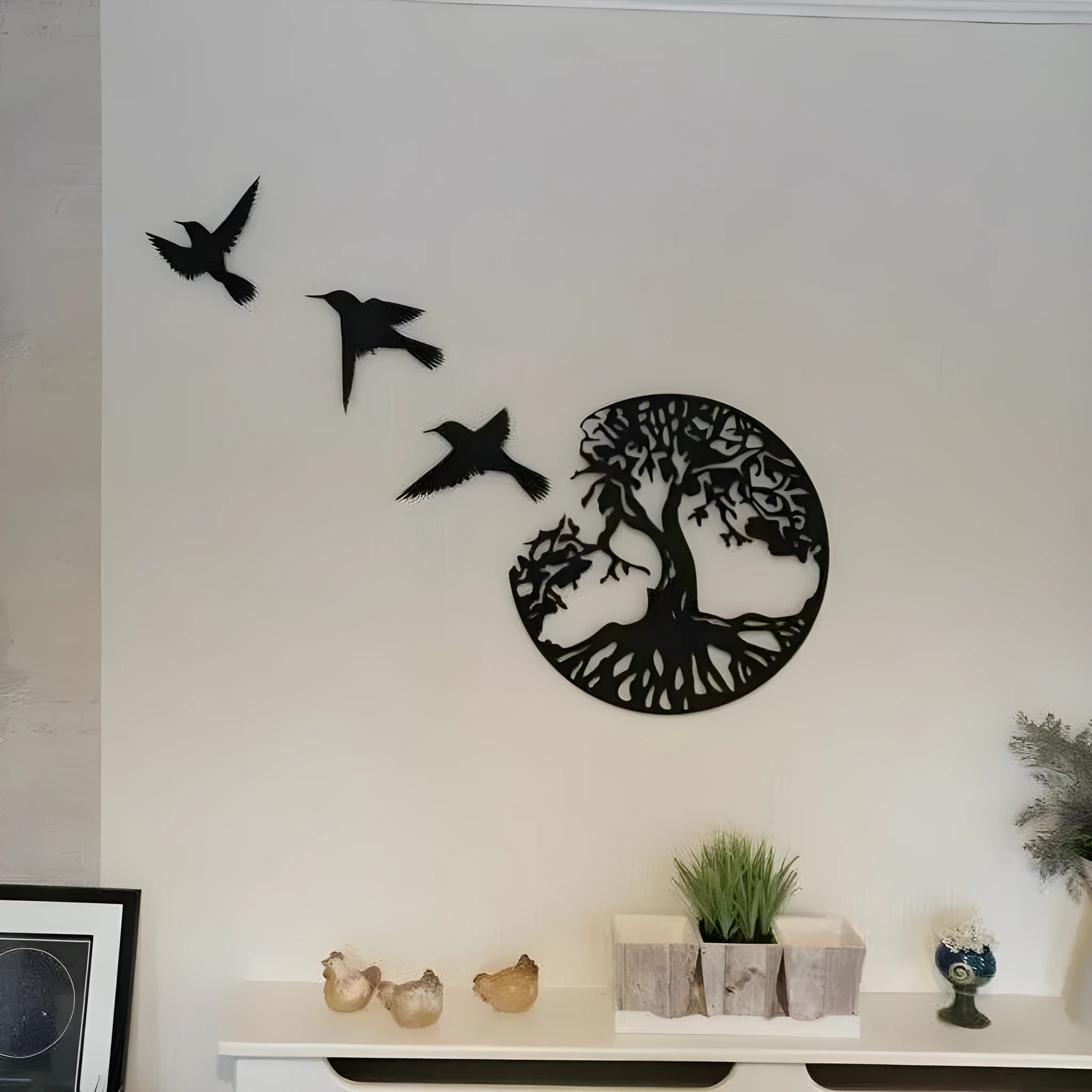 Black iron decorative wind chime wall hanging with a modern simple design.