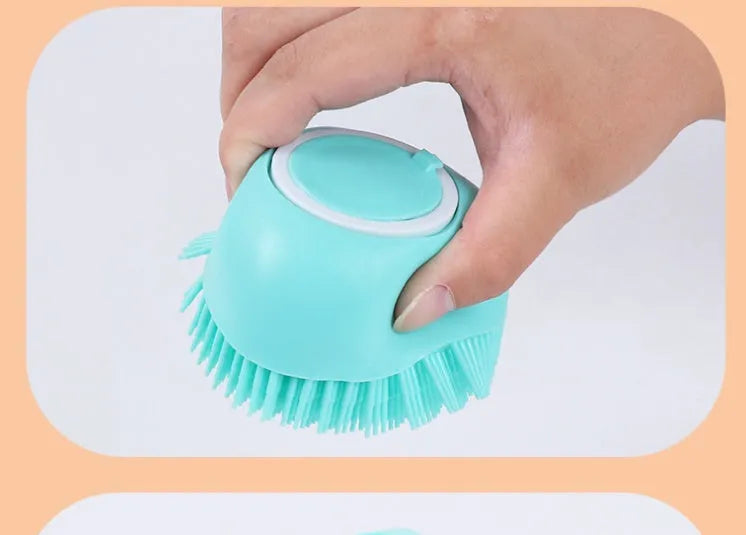 Blue silicone dog bath brush fitting over fingers for pet washing and massage
