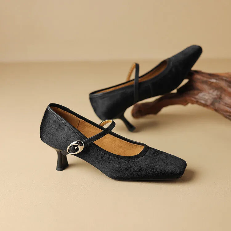 Women's black square toe stiletto ankle-strap high heels with horse hair upper shown from side angle
