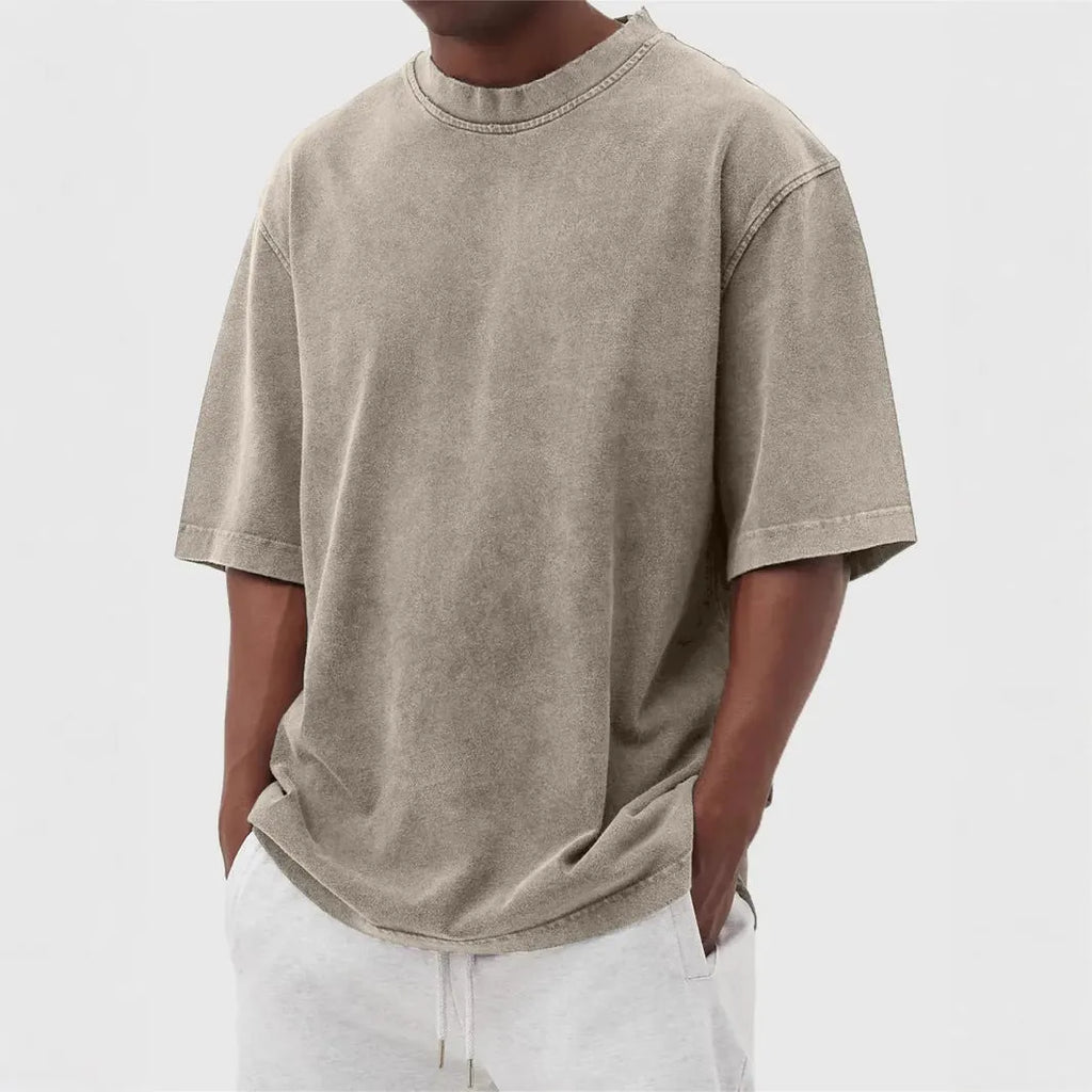 Men's stonewash distressed polyester pullover T-shirt in solid colour with loose fit and half sleeves