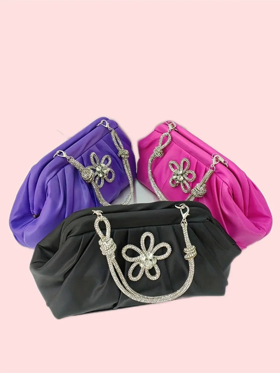 Women's soft polyester messenger bag with diamond folds and chain detailing in black colour