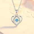 Blue diamond coloured beating heart necklace and bracelet set with gem inlaid pendant on electroplated copper.