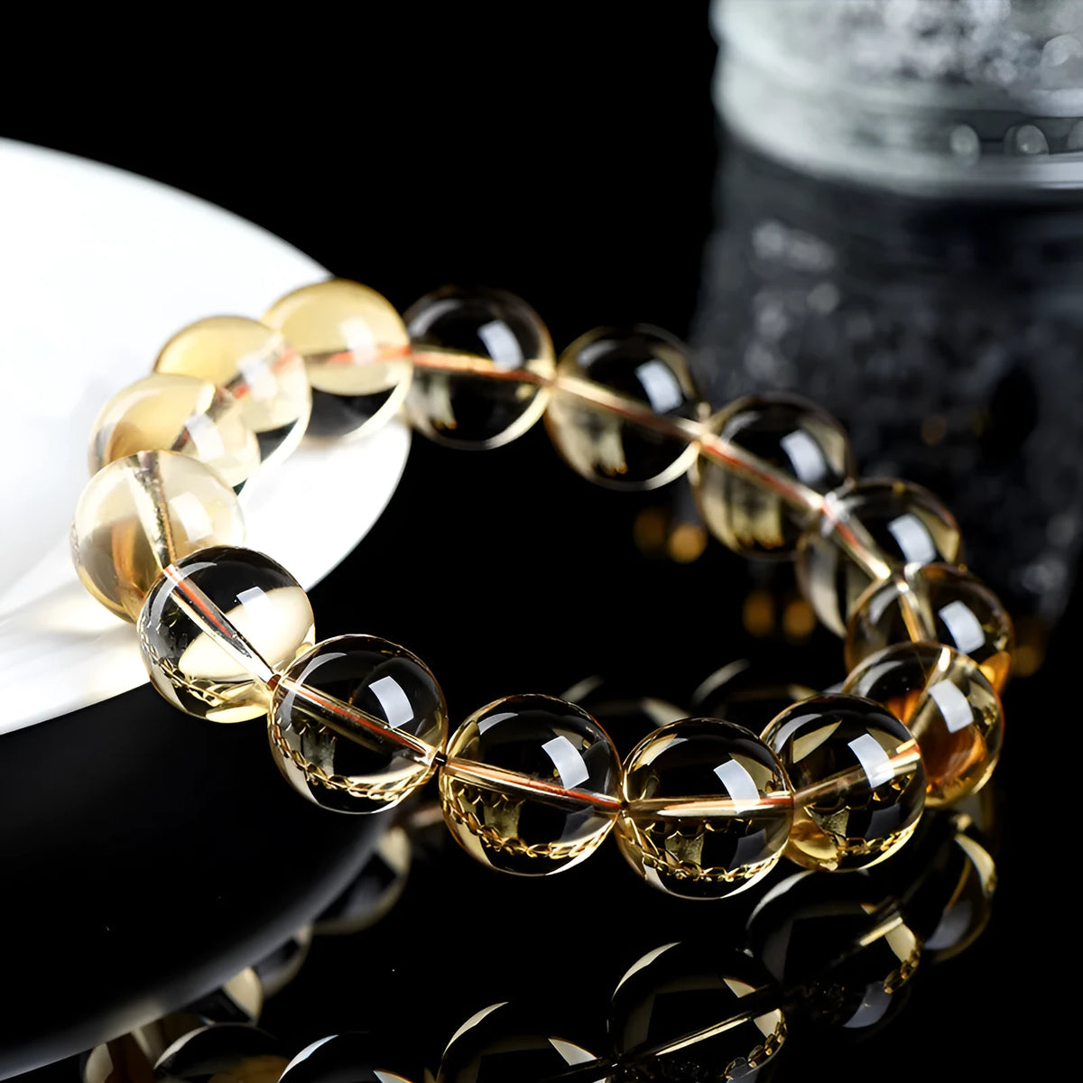 Natural citrine scattered bead bracelet showing original design with polished beads in varying arrangements