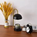 Solid wood aromatherapy wax melting lamp with dimmable LED light on bedside table