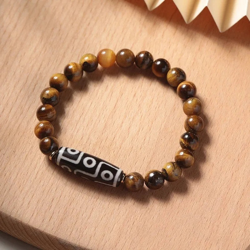 Tigereye stone Buddha bracelet with single circle rosary design showing natural banded patterns on beads