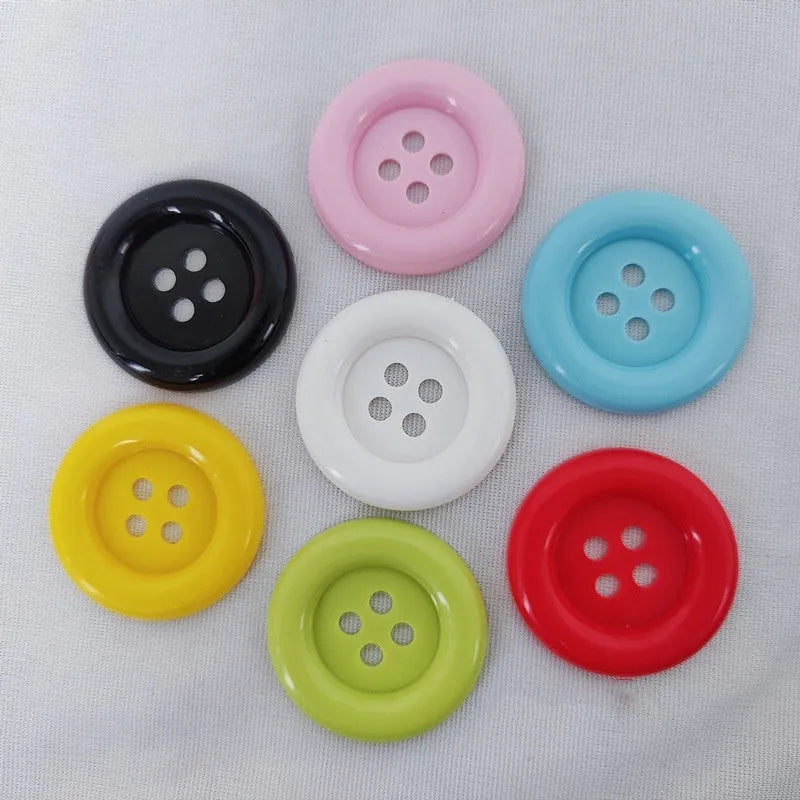 Oversized round edge plastic nylon sewing buttons with four holes in multiple colours