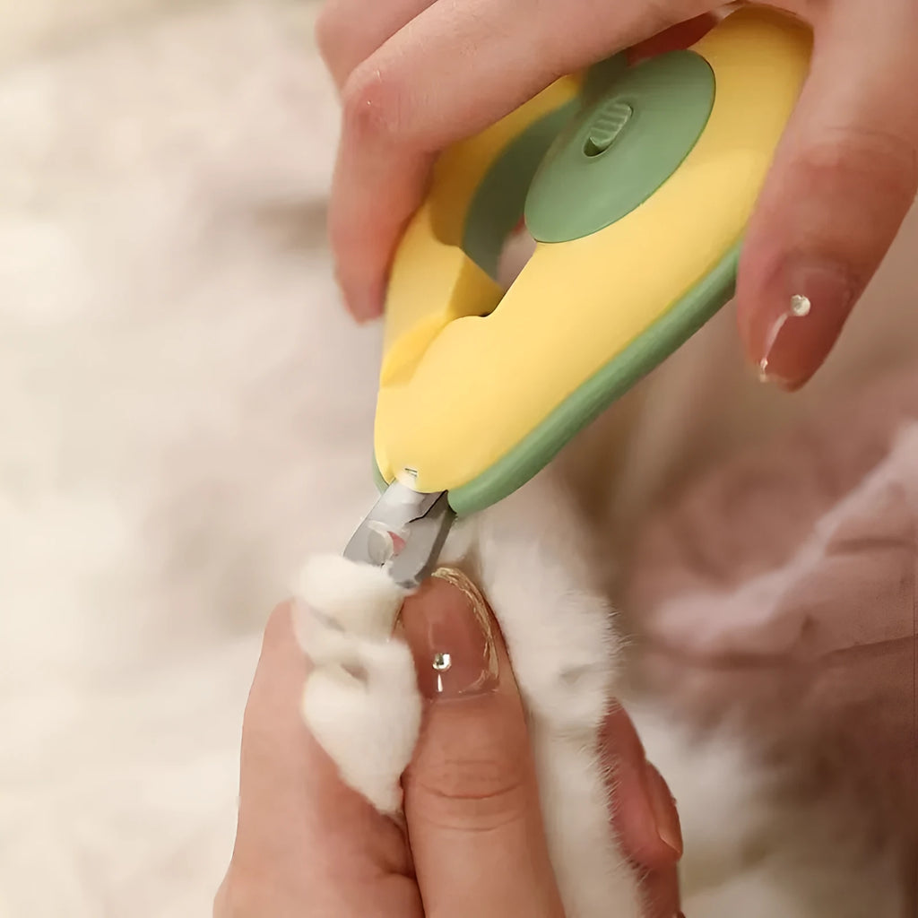 Professional LED pet nail clipper with non-slip grip for small dogs and cats in green, pink and white colours