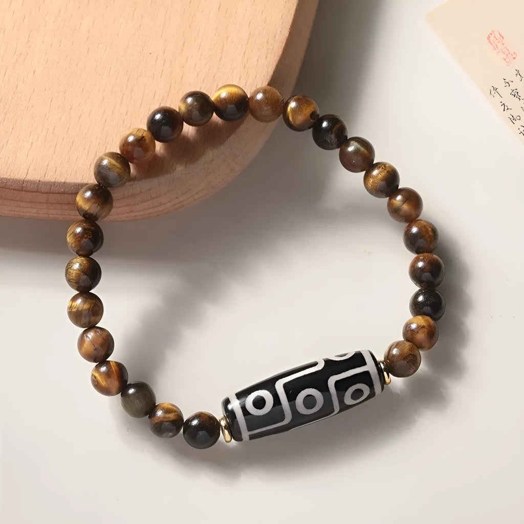 Tigereye stone Buddha bracelet with single circle rosary design showing natural banded patterns on beads
